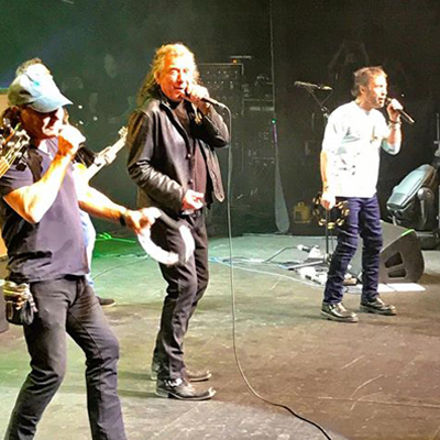 Brian Johnson volta aos palcos e canta com Robert Plant e Paul Rodgers